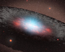 Representación artística de un agujero negro supermasivo en el centro de una galaxia. Imagen: NASA/JPL-Caltech