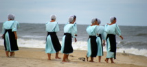Mujeres amish en la playa de Chincoteague, Virginia, USA. Foto: Pasteur