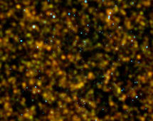 Los puntos azules corresponden a galaxias activas, emisoras de rayos X, detectadas desde el Observatorio Espacial Herschel de la ESA. Imagen: ESA/Hrschel/HerMES, NASA/CXC