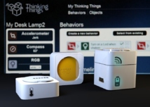 Varios de los instrumentos de "Thinking things": una batería, un módulo central y varios sensores (temperatura/humedad y acelerómetro). Fuente: Telefónica Digital.