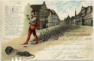 Postal de 1902, con la imagen del Flautista de Hamelín. Imagen: loki11. Fuente: Wikimedia Commons.