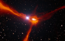 Impresión artística de una galaxia acretando material de su entorno. Fuente: ESO.