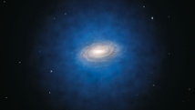 Recreación artística de la Vía Láctea y su halo de materia oscura circundante (en azul, aunque en realidad es invisible). Fuente: ESO/L. Calçada.