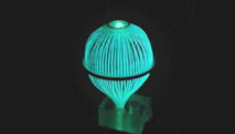 El colector de luz con forma de bombilla, que absorbe luz verde y emite luz azul.