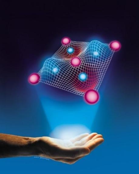 Las bolas representan los átomos de cobre y oxígeno, y las superficies azules (positivas) y rojas (negativas), las partes de la onda que describe al electrón. Imagen: Mario Sermoneta. Fuente: Universidad Bar Ilan.