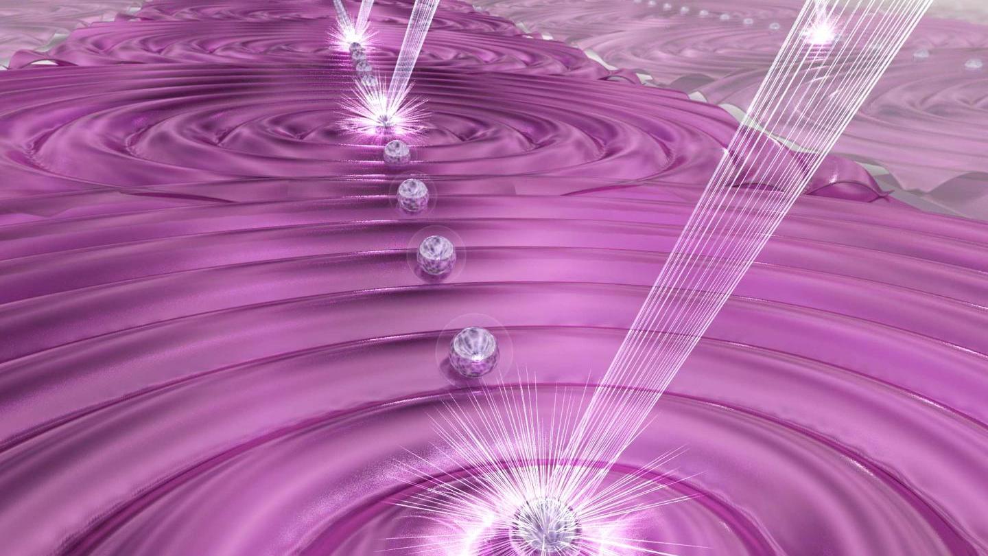 Ilustración artística de una simulación cuántica. Los láseres manipulan un conjunto de 50 cúbits atómicos para estudiar las dinámicas del magnetismo cuántico.Crédit : E. Edwards/JQI