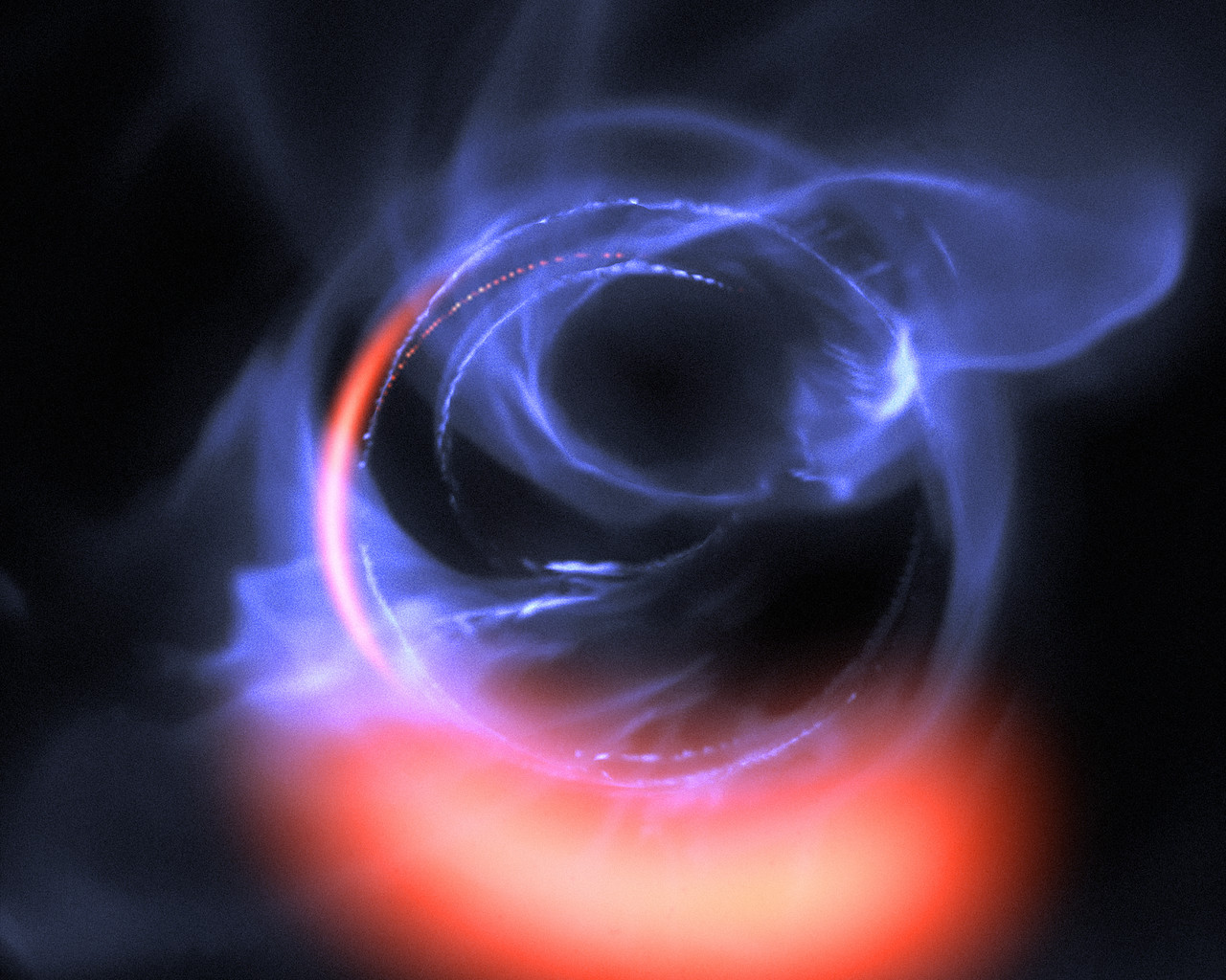 Simulación de material orbitando cerca de un agujero negro. Fuente: ESO/Gravity Consortium/L. Calçada