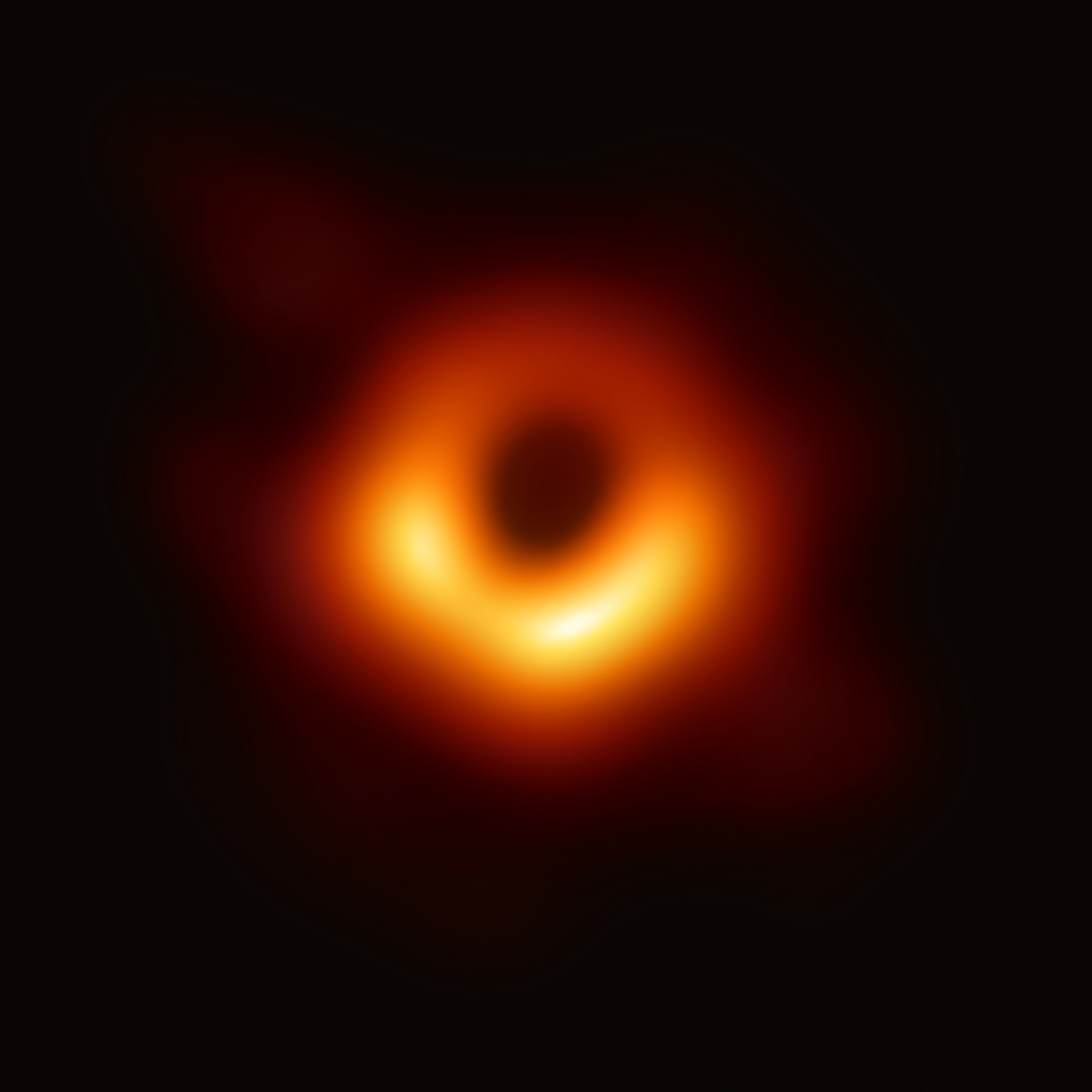 Primera imagen real de la historia de un agujero negro supermasivo ubicado en el centro de la galaxia M87 presentado el 10 de abril de 2019 por el consorcio internacional Telescopio del Horizonte de Sucesos. EHT.
