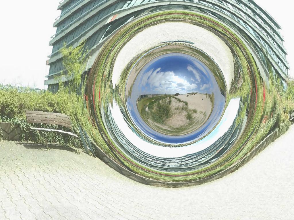 Imagen de un agujero de gusano que se puede atravesar que conectaría el área frente al instituto de física de la Universidad de Tubinga con las dunas próximas a Boulogne-sur-Mer, en el norte de Francia. Corvin Zahn, Institute of Physics, Universität Hildesheim.