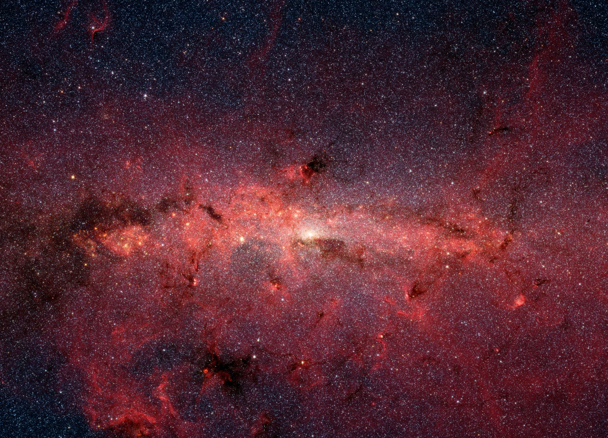 Foto infrarroja del núcleo de la Vía Láctea, tomada con el telescopio espacial Spitzer. Foto: NASA / JPL-Caltech