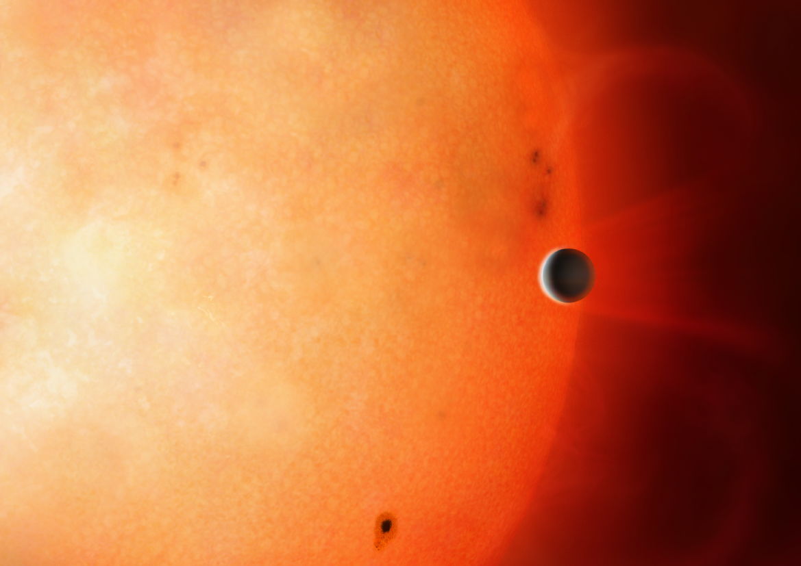 Creación artística del exoplaneta TOI 849 orbitando su estrella en el llamado desierto de Neptuno. Crédito: Universidad de Warwick / Mark Garlick.