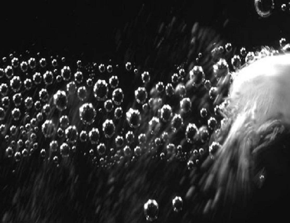 Imagen que muestra una partícula de carbonato liberando dióxido de carbono y propulsándose a una velocidad alta a través de una solución acuosa. Fuente: James Baylis